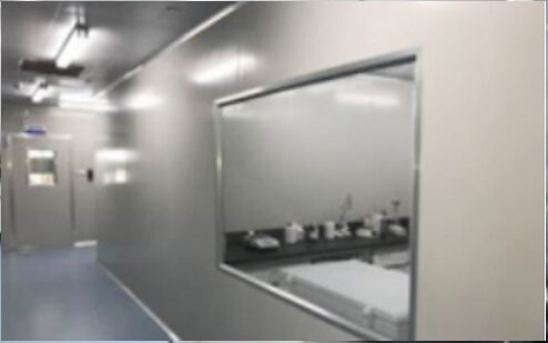 Clean-room corridor with an observation window